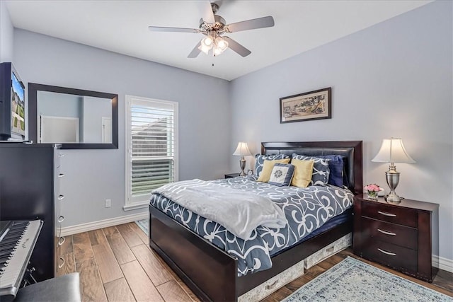 bedroom featuring ceiling fan and wood-type flooring