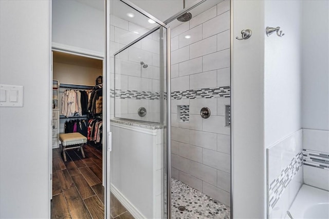 bathroom featuring an enclosed shower