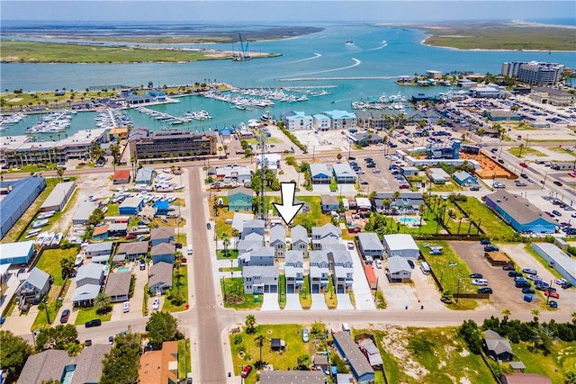 birds eye view of property featuring a water view