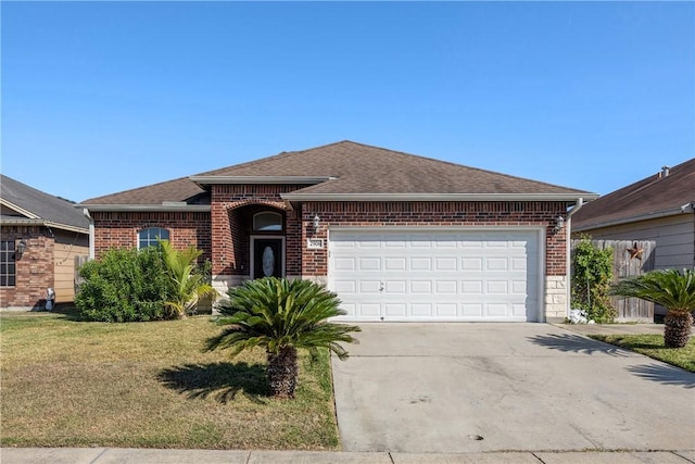 ranch-style home with a garage and a front yard