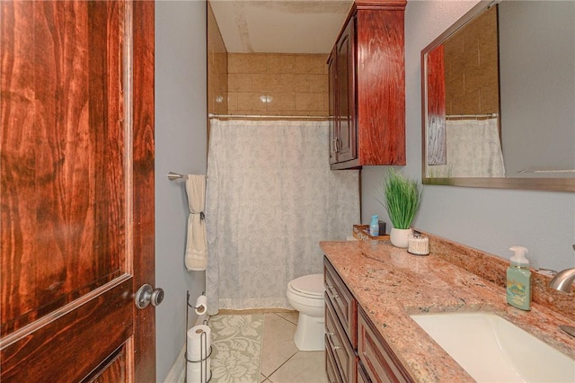 bathroom with tile patterned floors, curtained shower, toilet, and vanity