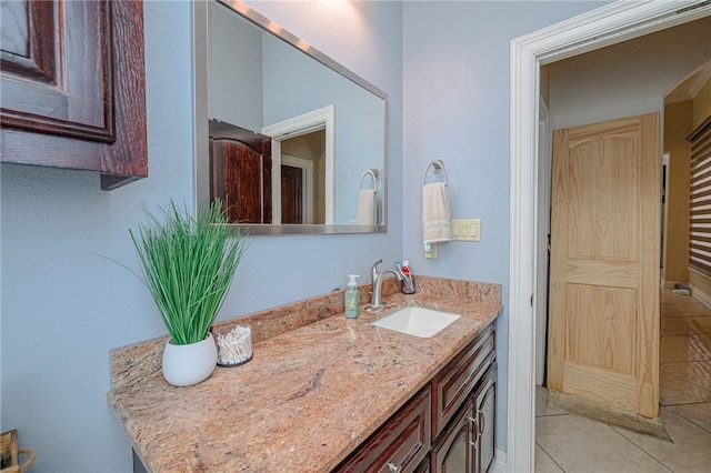 bathroom featuring tile patterned floors and vanity