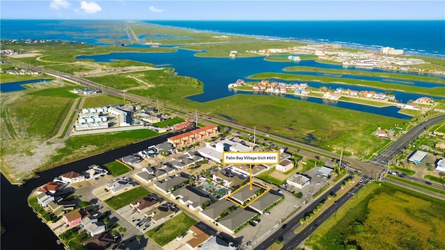 birds eye view of property featuring a water view