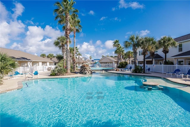 view of swimming pool featuring a patio area