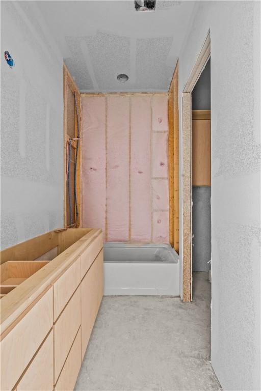 4018 Talbot Dr, Corpus Christi, TX 78414 - full bath with unfinished concrete flooring and bathtub / shower combination