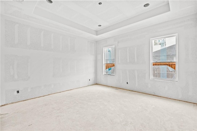 4018 Talbot Dr, Corpus Christi, TX 78414 - empty room featuring a raised ceiling and healthy amount of natural light