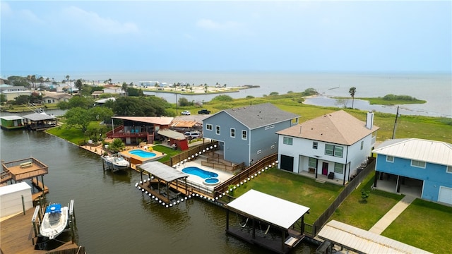 drone / aerial view with a water view