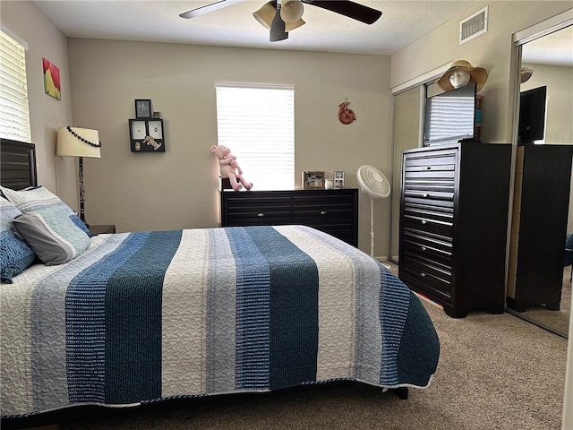 4117 Cork Dr, Corpus Christi, TX 78413 - bedroom with carpet flooring, multiple windows, and ceiling fan