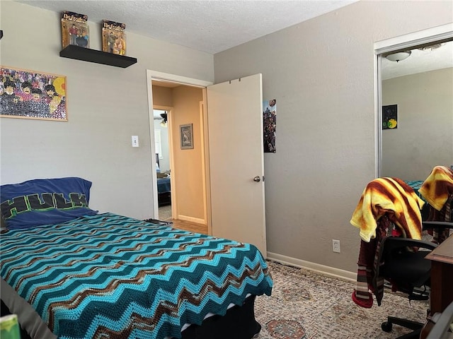 4117 Cork Dr, Corpus Christi, TX 78413 - bedroom with carpet and baseboards