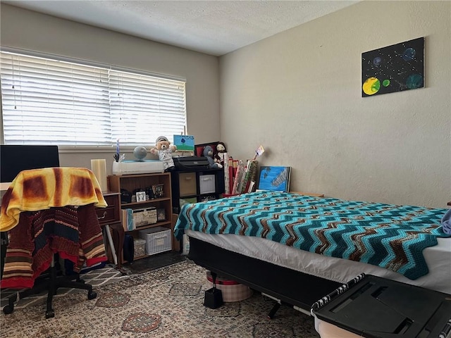 4117 Cork Dr, Corpus Christi, TX 78413 - bedroom featuring a textured ceiling and an office area