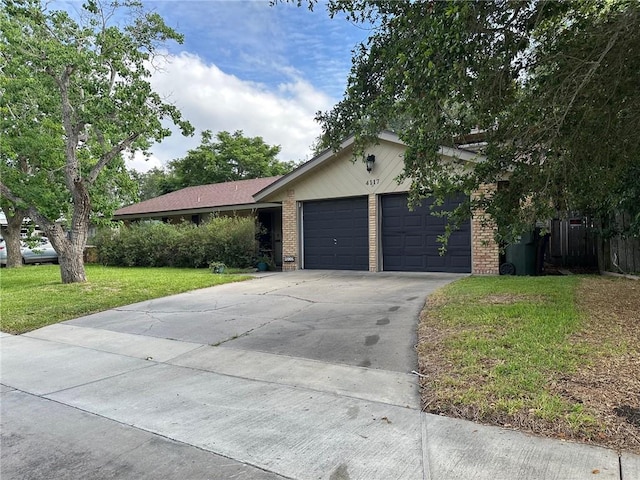 4117 Cork Dr, Corpus Christi, TX 78413 - ranch-style home with a garage, a front yard, brick siding, and driveway