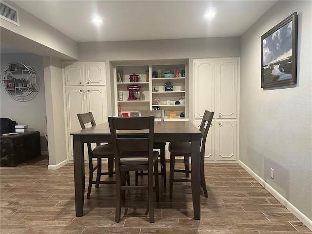 4117 Cork Dr, Corpus Christi, TX 78413 - dining room featuring dark wood finished floors and baseboards