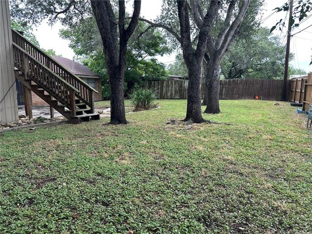 4117 Cork Dr, Corpus Christi, TX 78413 - fenced backyard with stairs