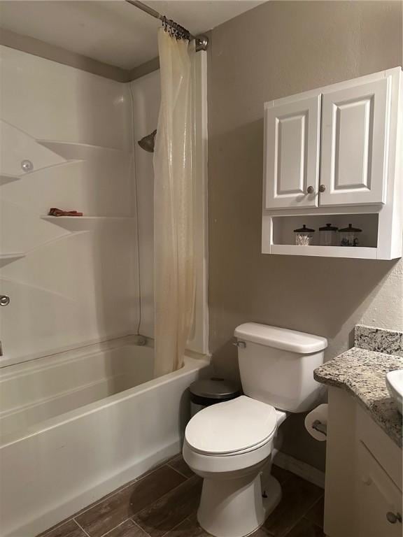 4117 Cork Dr, Corpus Christi, TX 78413 - full bath with shower / bath combo with shower curtain, vanity, and wood finished floors