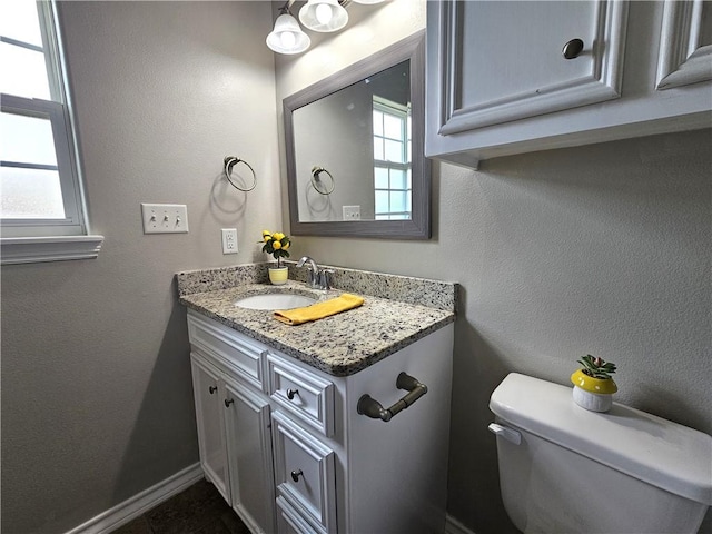 2021 Orange St, Corpus Christi, TX 78418 - bathroom featuring toilet and vanity