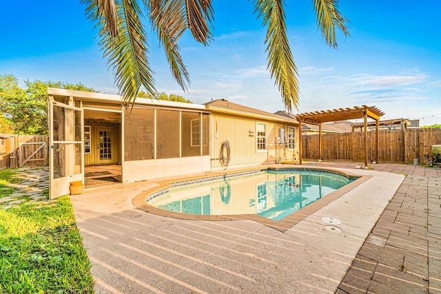 3105 Quebec Dr, Corpus Christi, TX 78414 - view of pool with a pergola, a sunroom, a patio, and a fenced backyard