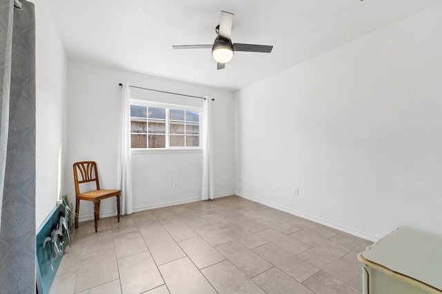 3105 Quebec Dr, Corpus Christi, TX 78414 - unfurnished room featuring ceiling fan, light tile patterned flooring, and baseboards