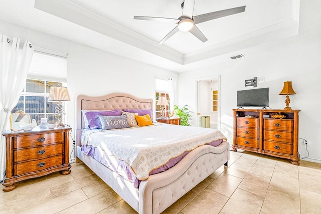 3105 Quebec Dr, Corpus Christi, TX 78414 - bedroom featuring a raised ceiling, crown molding, light tile patterned floors, ceiling fan, and ensuite bathroom