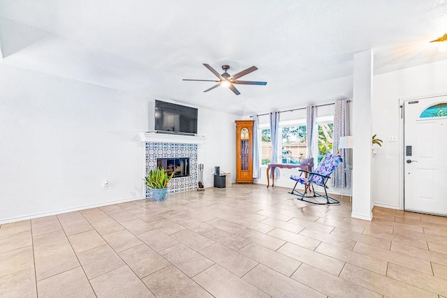 3105 Quebec Dr, Corpus Christi, TX 78414 - living area with a ceiling fan, a fireplace, baseboards, and tile patterned floors
