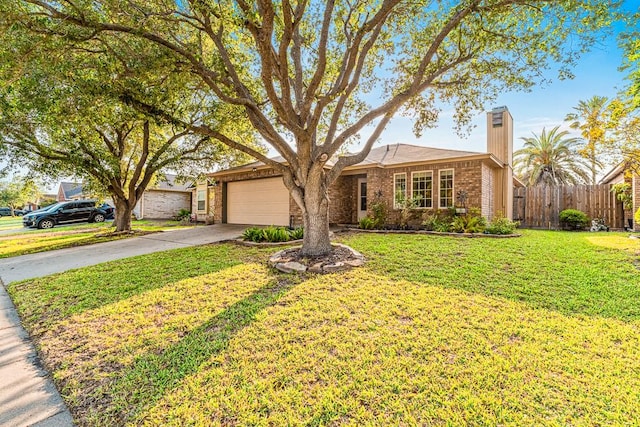 3105 Quebec Dr, Corpus Christi, TX 78414 - view of front facade featuring a chimney, brick siding, an attached garage, and driveway