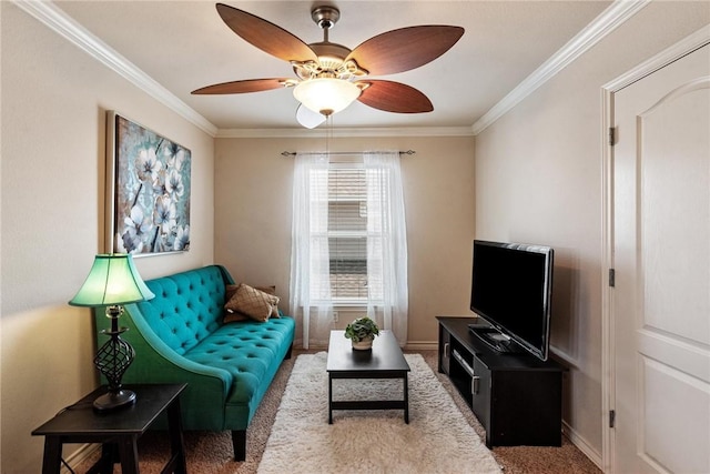 carpeted living room featuring crown molding, baseboards, and a ceiling fan
