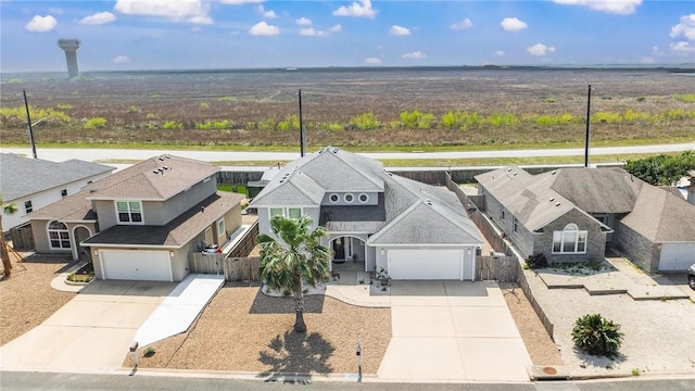birds eye view of property with a residential view