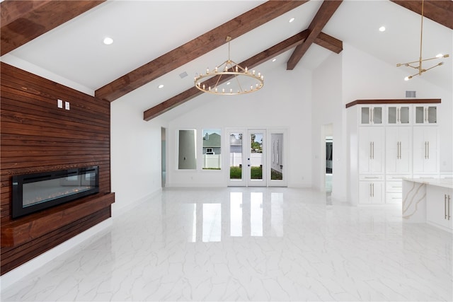 living room with high vaulted ceiling, beam ceiling, and an inviting chandelier