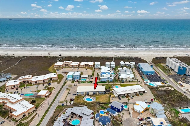 aerial view with a beach view and a water view