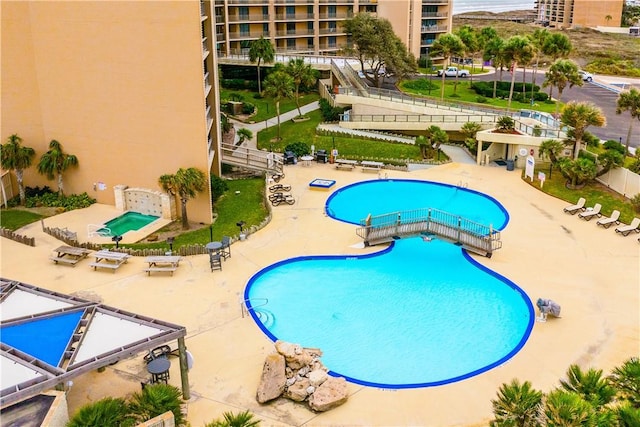 view of swimming pool with a patio