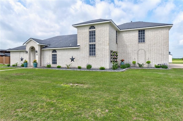 6041 King Trl, Corpus Christi, TX 78414 - view of front of house with brick siding and a front lawn