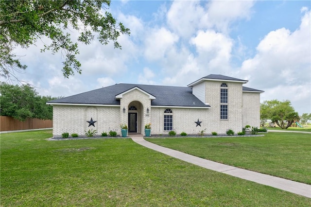 6041 King Trl, Corpus Christi, TX 78414 - view of front facade featuring brick siding and a shingled roof