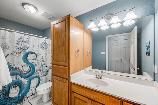 6041 King Trl, Corpus Christi, TX 78414 - bathroom with toilet, vanity, tile patterned floors, and a shower with curtain