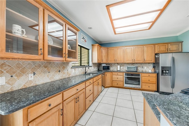 6041 King Trl, Corpus Christi, TX 78414 - kitchen featuring stainless steel appliances, light tile patterned floors, ornamental molding, a sink, and tasteful backsplash
