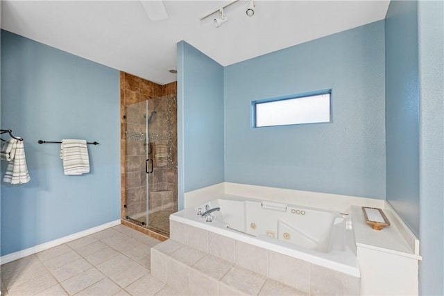 6041 King Trl, Corpus Christi, TX 78414 - bathroom featuring a shower stall, a whirlpool tub, tile patterned floors, and baseboards