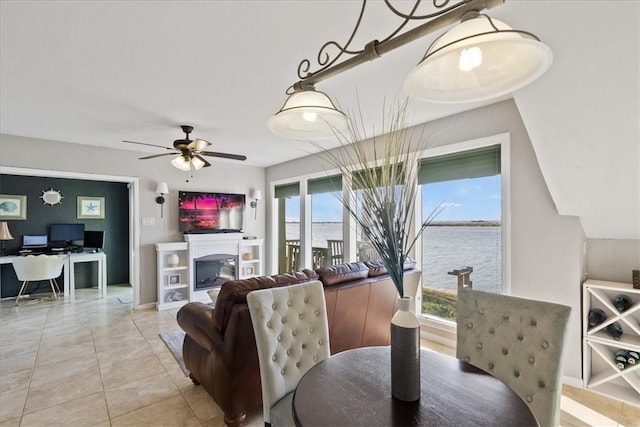 dining room featuring ceiling fan and light tile patterned flooring