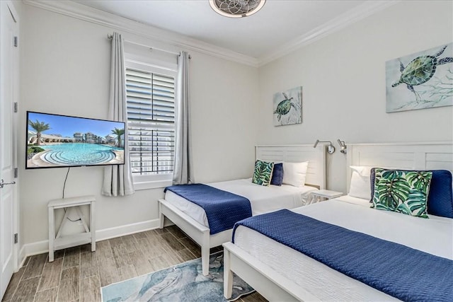 bedroom featuring crown molding