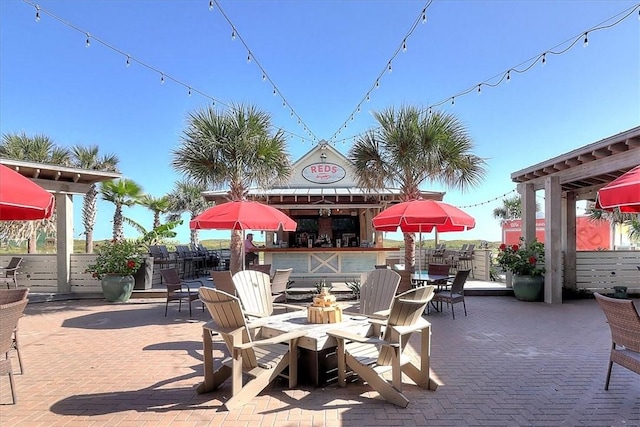 view of patio with exterior bar