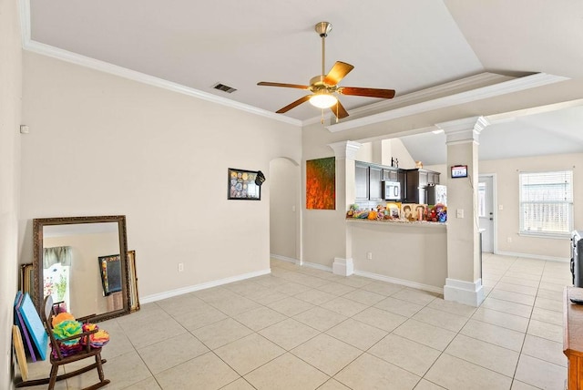 7418 Oshman Dr, Corpus Christi, TX 78414 - unfurnished living room featuring a ceiling fan, light tile patterned floors, ornamental molding, ornate columns, and baseboards