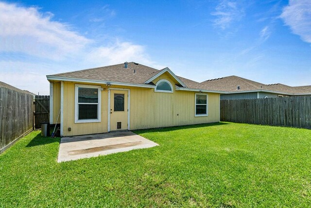 7418 Oshman Dr, Corpus Christi, TX 78414 - back of property with a patio area and a shingled roof