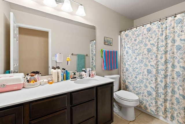 7418 Oshman Dr, Corpus Christi, TX 78414 - bathroom with toilet, vanity, tile patterned flooring, and a shower with curtain