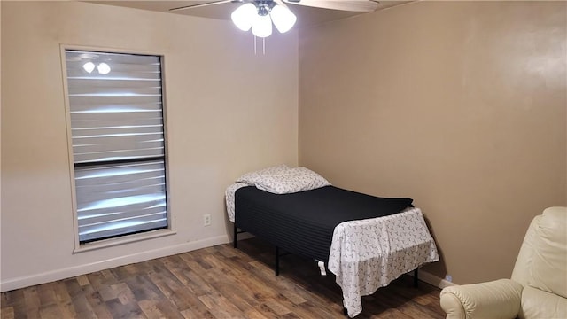 bedroom with wood-type flooring and ceiling fan