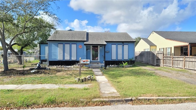 view of front of property with a front lawn