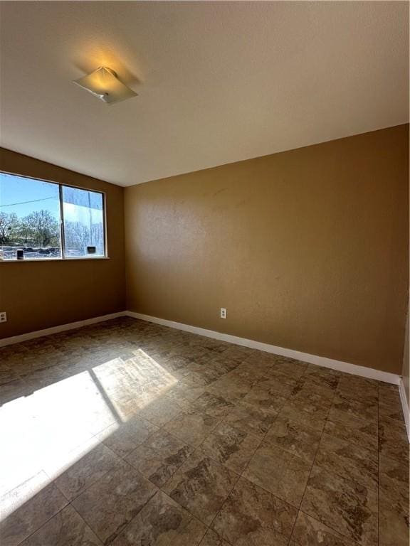 616 Hall St Unit A & B, Sinton, TX 78387 - empty room with baseboards