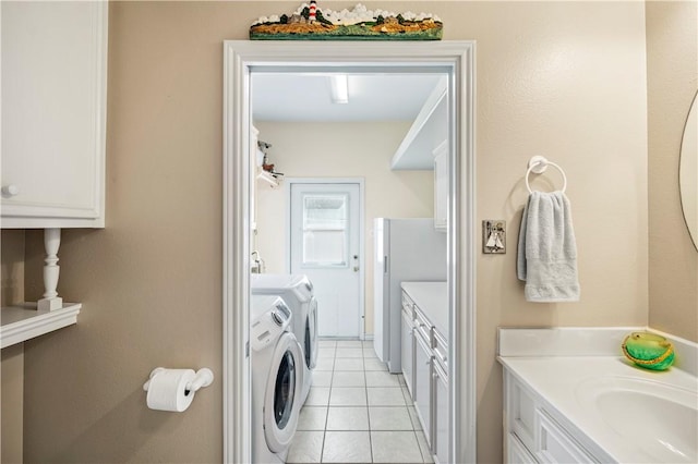 14106 Palo Seco Dr, Corpus Christi, TX 78418 - bathroom with vanity, tile patterned flooring, and washer and dryer