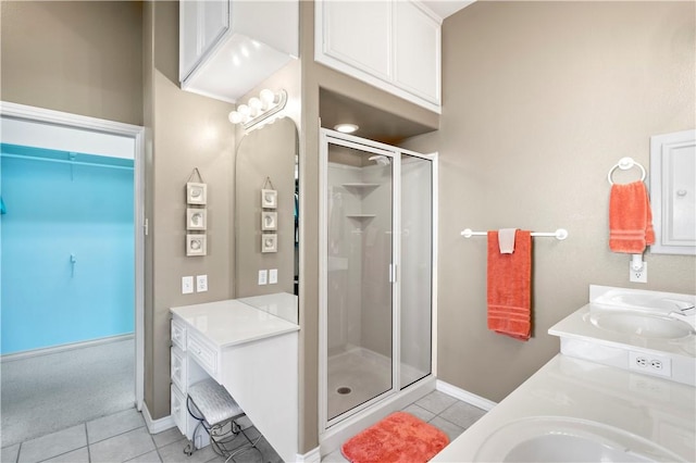 14106 Palo Seco Dr, Corpus Christi, TX 78418 - bathroom featuring a sink, tile patterned flooring, double vanity, and a stall shower