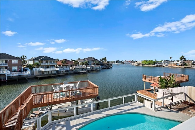 14106 Palo Seco Dr, Corpus Christi, TX 78418 - exterior space with an outdoor pool, a water view, and a residential view