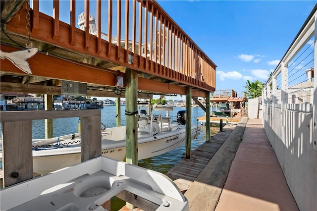 14106 Palo Seco Dr, Corpus Christi, TX 78418 - dock area with boat lift and a water view