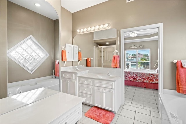 14106 Palo Seco Dr, Corpus Christi, TX 78418 - ensuite bathroom featuring a bath, a shower stall, vanity, and connected bathroom