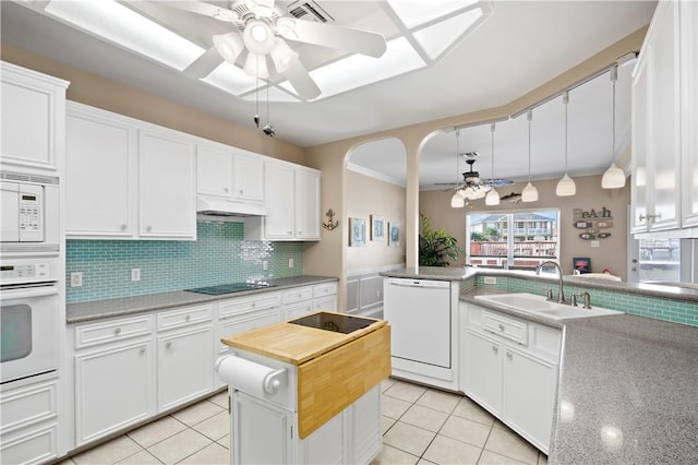 14106 Palo Seco Dr, Corpus Christi, TX 78418 - kitchen featuring white appliances, a sink, ceiling fan, and tasteful backsplash