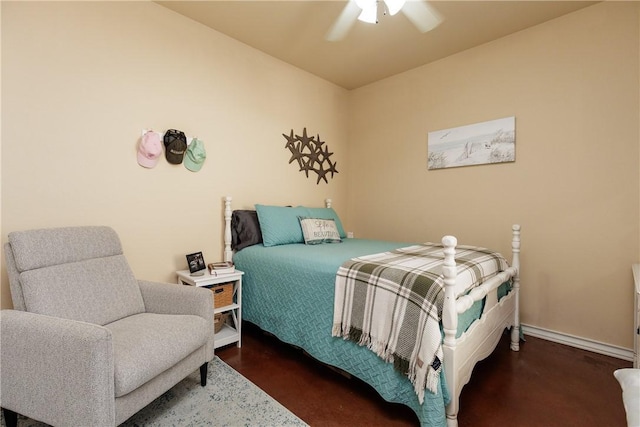 bedroom featuring ceiling fan, dark wood finished floors, and baseboards